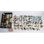 Collection of Britain's Deetail toy soldier figure, including horses with riders and a box of