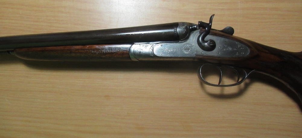 Breda 12 bore, side by side double trigger hammer gun, with 27 1/2 inch barrels, 40 1/4 inch - Image 2 of 3