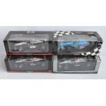 Four 1/18 scale diecast Formula 1 racing car models from Paul's Model Art/Minichamps to include