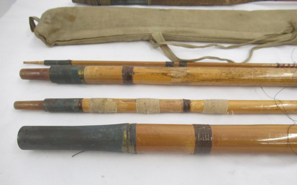 A pair of vintage fishing rods. To include a split cane three-section fly rod sold by the A.W. - Image 2 of 6