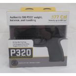 Sig Sauer P320 .177 CO2 air pistol with 30 rnd belt fed magazine, in original box