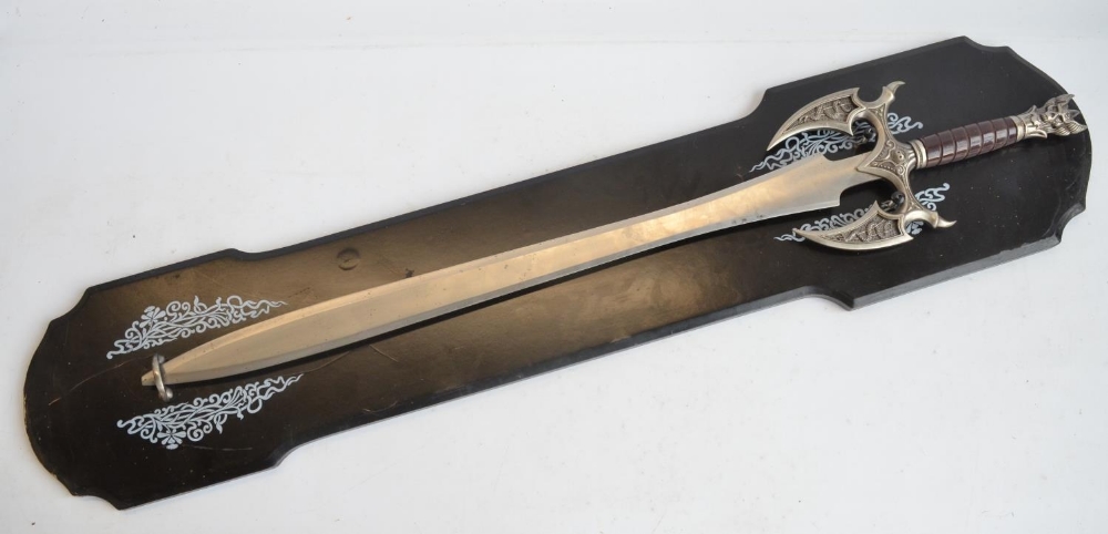 Replica metal bladed fantasy sword from Ancient Warrior (series unknown) with wall mounting