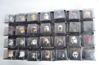 Complete collection of 80 DeAgostini cased Star Wars helmet models, all but one unopened/factory