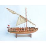 Well constructed wooden plank on frame static model of a Napoleonic Wars era 12 oar British gunboat