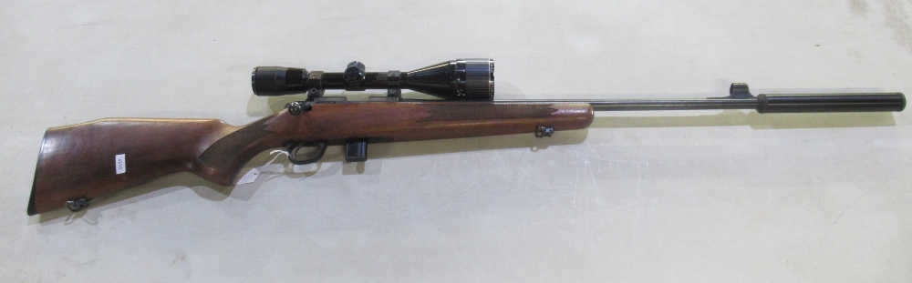 Sako P945 .22 calibre bolt action rifle. With detachable moderator, Nikko scope, and original