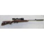 Sako P945 .22 calibre bolt action rifle. With detachable moderator, Nikko scope, and original