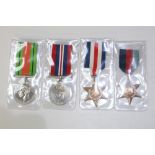 A selection of four medals. To include a France and Germany Medal, a 1939-1945 Star, a George VI