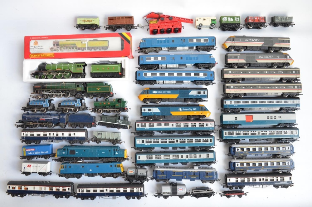 Collection of previously run OO gauge railway locomotives, coaches, goods wagons etc., mostly Hornby