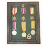 Framed collection of Medals. Africa Star, 1939-45 Star, Italy Star, 1939-45 Defence Medal, War