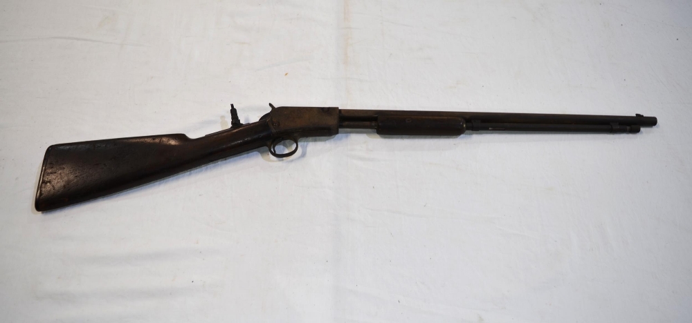 Rare Winchester .22 rim fire pump action rifle, circa 1890 with additional rear sight, overall L3ft,