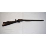 Rare Winchester .22 rim fire pump action rifle, circa 1890 with additional rear sight, overall L3ft,