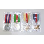 A selection of four medals. To include the Defence Medal, the Africa Star, the 1939-1945 Star, and a