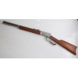 Rossi 38/357 Under lever Action rifle. Stainless steel finish, wooden stock and fore-end. Overall