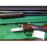 Cased Sable 12 bore side by side shotgun with 25 3/4 barrels, 14.5 inch straight through stock