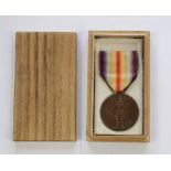 Japanese Allied Victory Medal, complete with ribbon and in original balsa wood box.