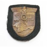 Wehrmacht Krim Campaign Shield(Crimea) Complete with prongs and original cloth backing.