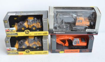 Four 1/50 scale diecast model plant vehicles to include 2x Ertl John Deere 624K wheel loaders (