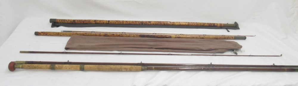 A vintage James Ogden wooden three-section Salmon rod with cork handle. In good condition and