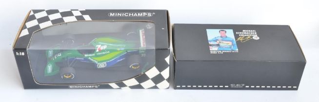 Two 1/18 scale diecast Michael Schumacher Formula 1 racing car models to include Minichamps 100