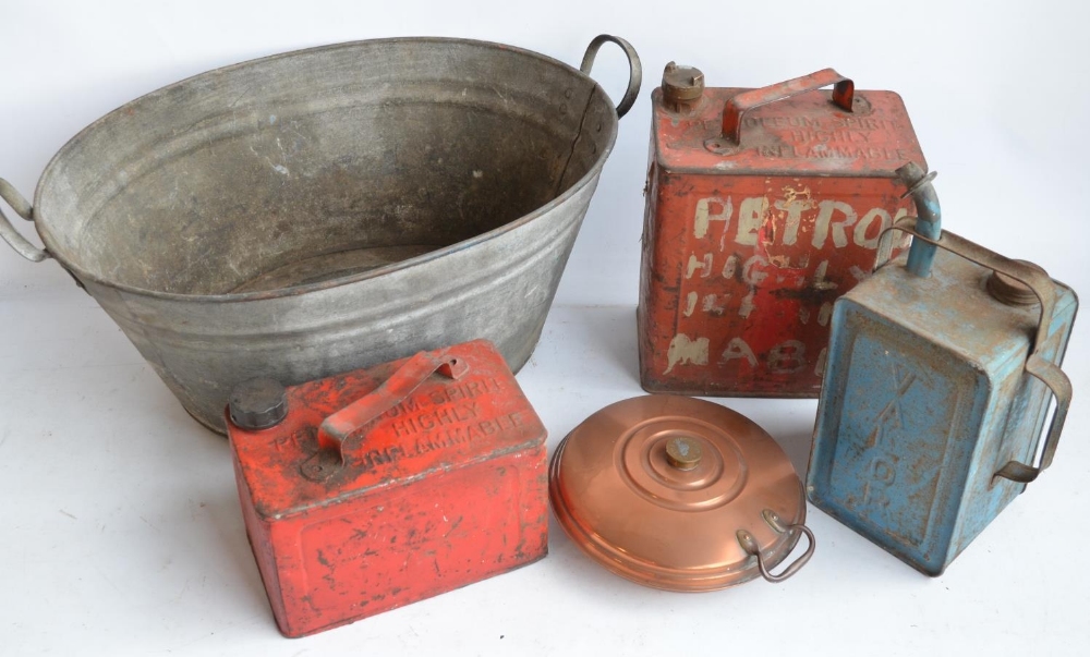 Three vintage oil/fuel cans to include a Valor Esso blue example. Also a galvanised tin bath and a