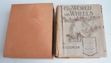 Hardback leather bound copy of The World On Wheels by H.O.Duncan, printed by Herbert Clarke,