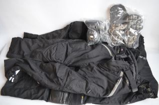 Three pairs of bikers trousers to include Belstaff Cordura Stormshield XL with armour, another