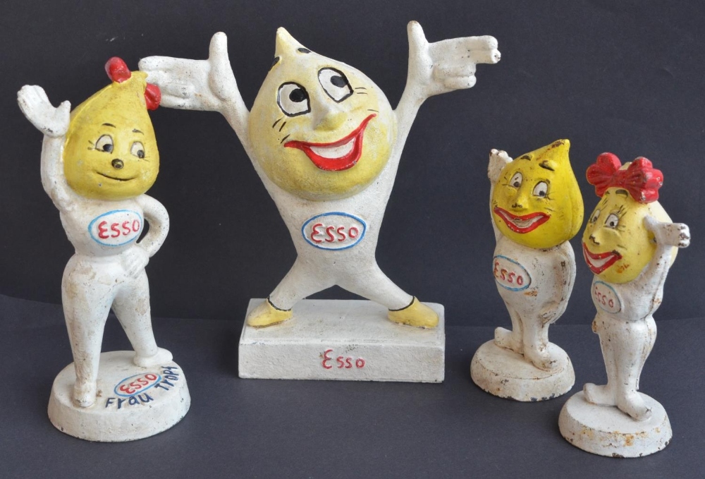 Four cast iron Esso coin bank figurines by M Busch Gmbh to include Frau Tropf etc.