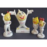 Four cast iron Esso coin bank figurines by M Busch Gmbh to include Frau Tropf etc.