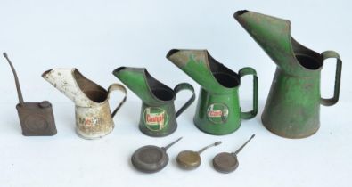 Four vintage oil cans from Castrol and Mobil (large green can missing makers sticker/decals) to