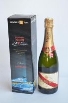 A boxed and unopened bottle of Renault official F1 Team Mumm Champagne