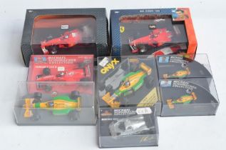 Collection of 8 diecast model racing car models in 1/43 and 1/87 scales to include 1/43 Hot Wheel