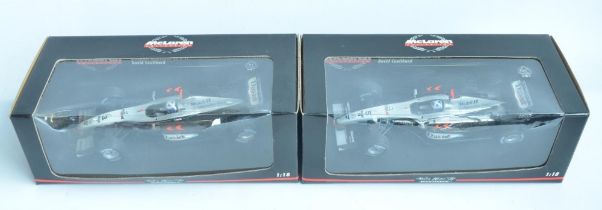 Two 1/18 scale diecast F1 David Coulthard McLaren Mercedes models from Minichamps/Paul's Model Art