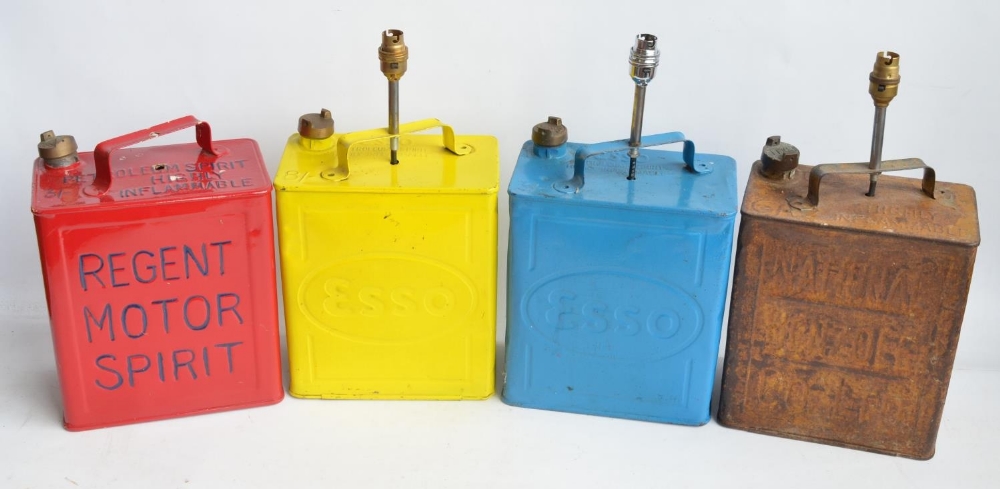 Four vintage oil cans repurposed as lamps to include repainted Regent Motor Spirit and 2x Esso