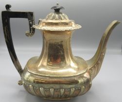 Victorian silver teapot, part lobed decoration with ebonised handle and finial by James Deakin &