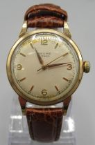 Baume 9ct gold wristwatch, signed parchment coloured dial, applied Arabic and baton hour indices,