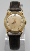 Longines 14ct gold wristwatch, signed silvered dial, applied Arabic and dagger baton indices,