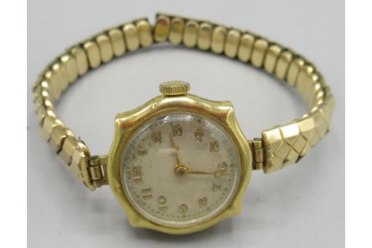 Ladies Swiss 18ct gold wristwatch on gold plated expanding bracelet, silvered dial, pressed gilt - Image 2 of 2