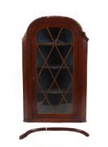 Property of a deceased estate - a George III mahogany corner wall cabinet with tracery glazed door