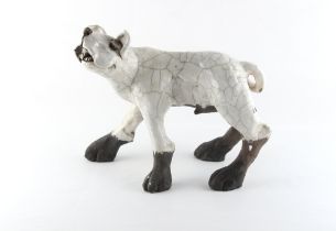 Property of a lady - Ian Gregory (1942-2021) - a raku glazed studio pottery model of a Hound Dog,