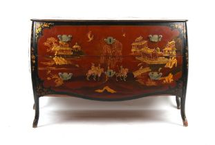 Property of a lady - a Continental red & black lacquer chinoiserie decorated two drawer bombe