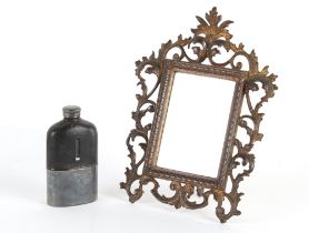 Property of a deceased estate - a late 19th / early 20th century cast metal framed mirror, with