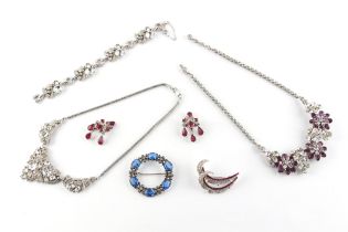 Property of a lady - a group of paste jewellery, comprising two necklaces, two brooches, a