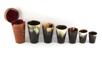 Property of a lady - a graduated set of six horn beakers, late 19th / early 20th century, the
