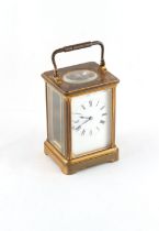 Property of a deceased estate - a late 19th century French brass corniche cased carriage clock