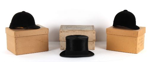 Property of a deceased estate - two black velvet riding hats (hunt caps), both boxed; together
