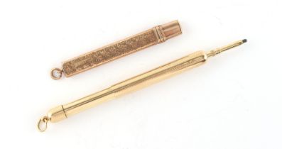 Property of a lady - a 9ct gold pencil holder, the gold weight approximately 6.1 grams; together