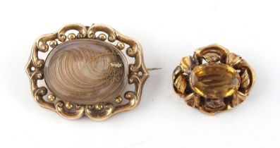 Property of a lady - a Victorian unmarked gold (tests 9ct) mourning brooch, with glazed panel