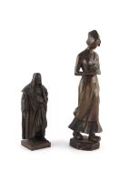 Property of a lady - a late 19th / early 20th century patinated bronze figure of a maid modelled