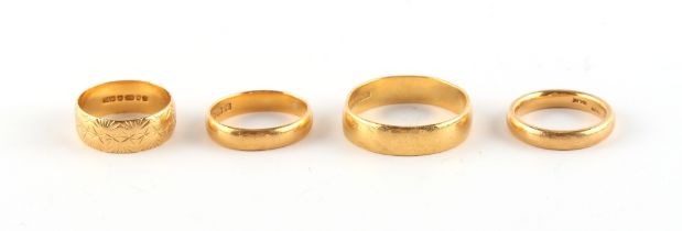 Property of a deceased estate - a gentleman's 22ct yellow gold wedding band, size Z; together with