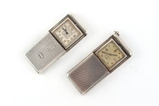 The Henry & Tricia Byrom Collection - two similar engine turned silver cased purse watches, both